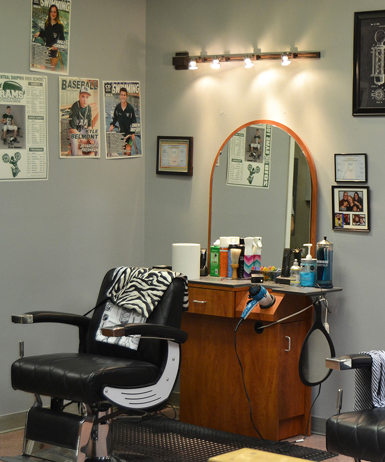 A photo taken inside the barbershop.